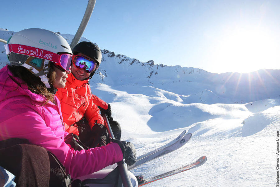Skiers discuss staying safe on the slopes on the chairlift in Val d'Isère